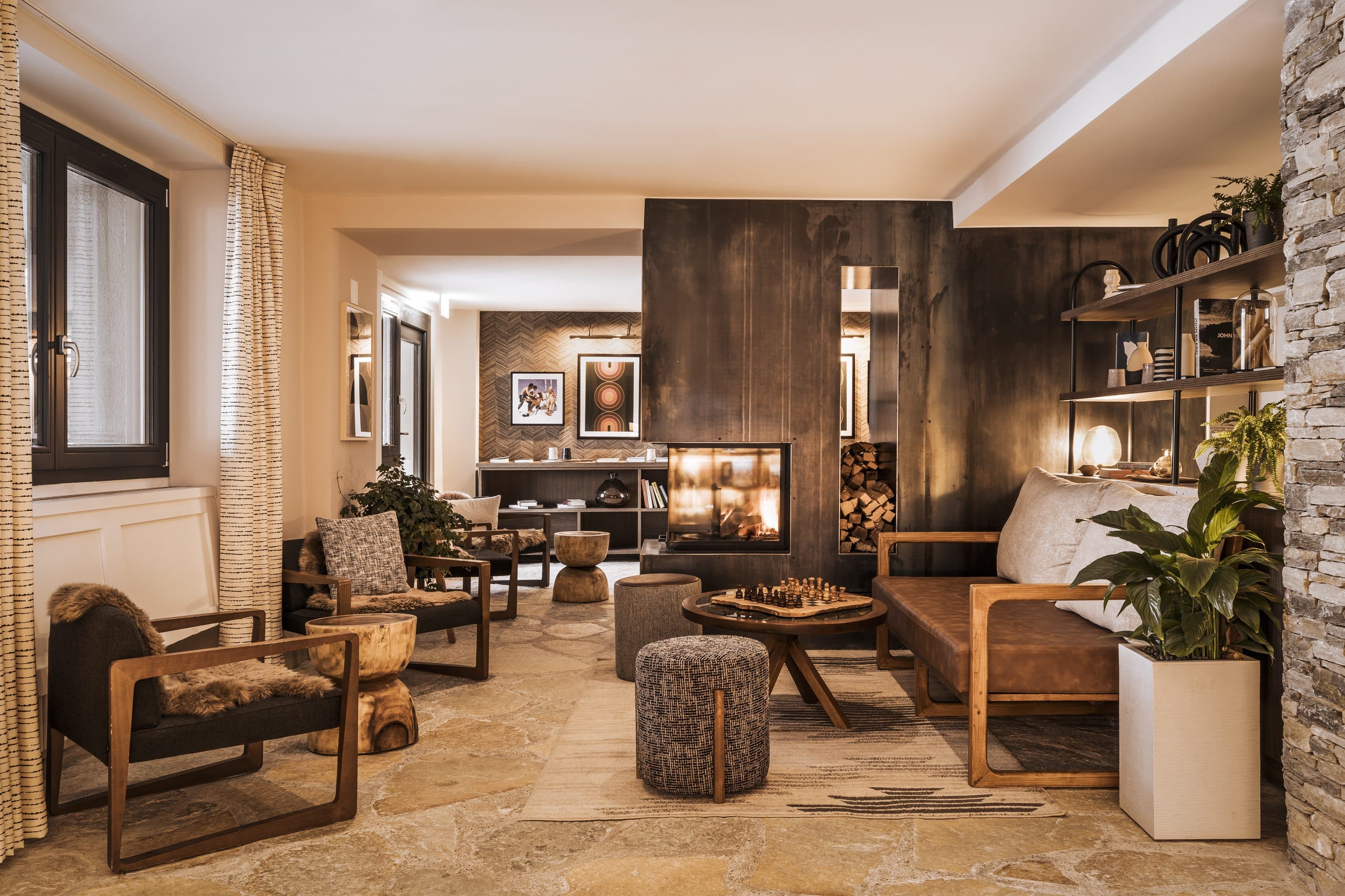 A luxury alpine lounge with fireplace